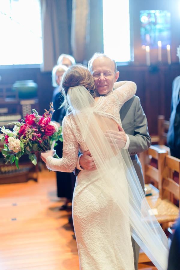 A bride hugs her rather as she reaches the alter after walking down the aisle at the Swedenborgian Church in San Francisco.