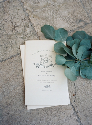 Wedding ceremony programs with eucalyptus leaves. 